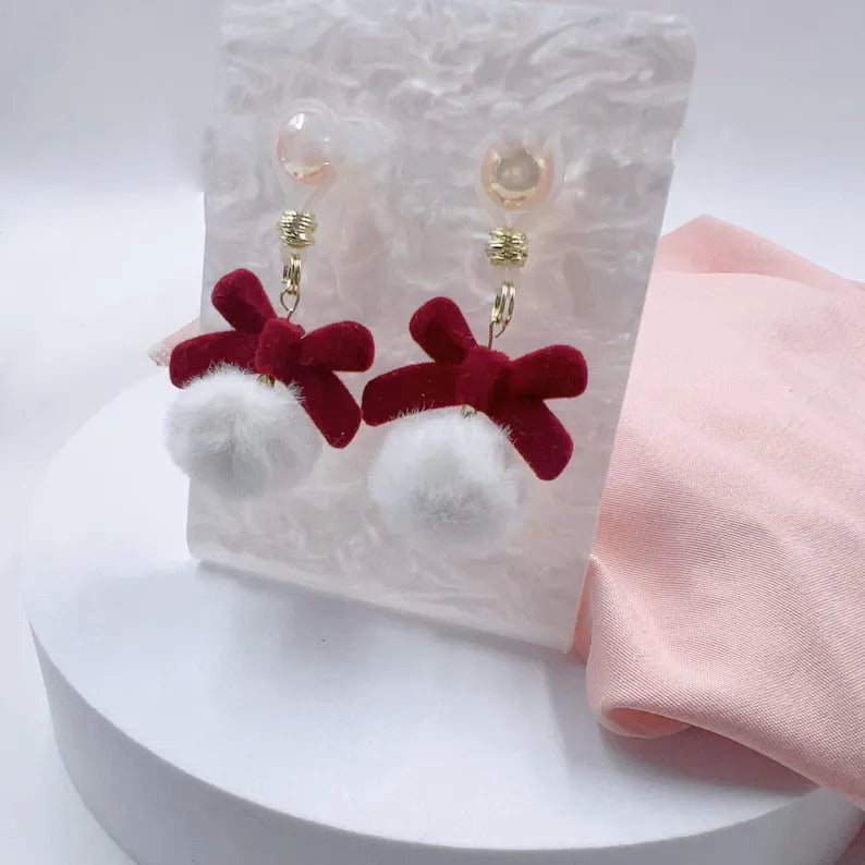 Christmas with velvet bow and fur ball nipple ring