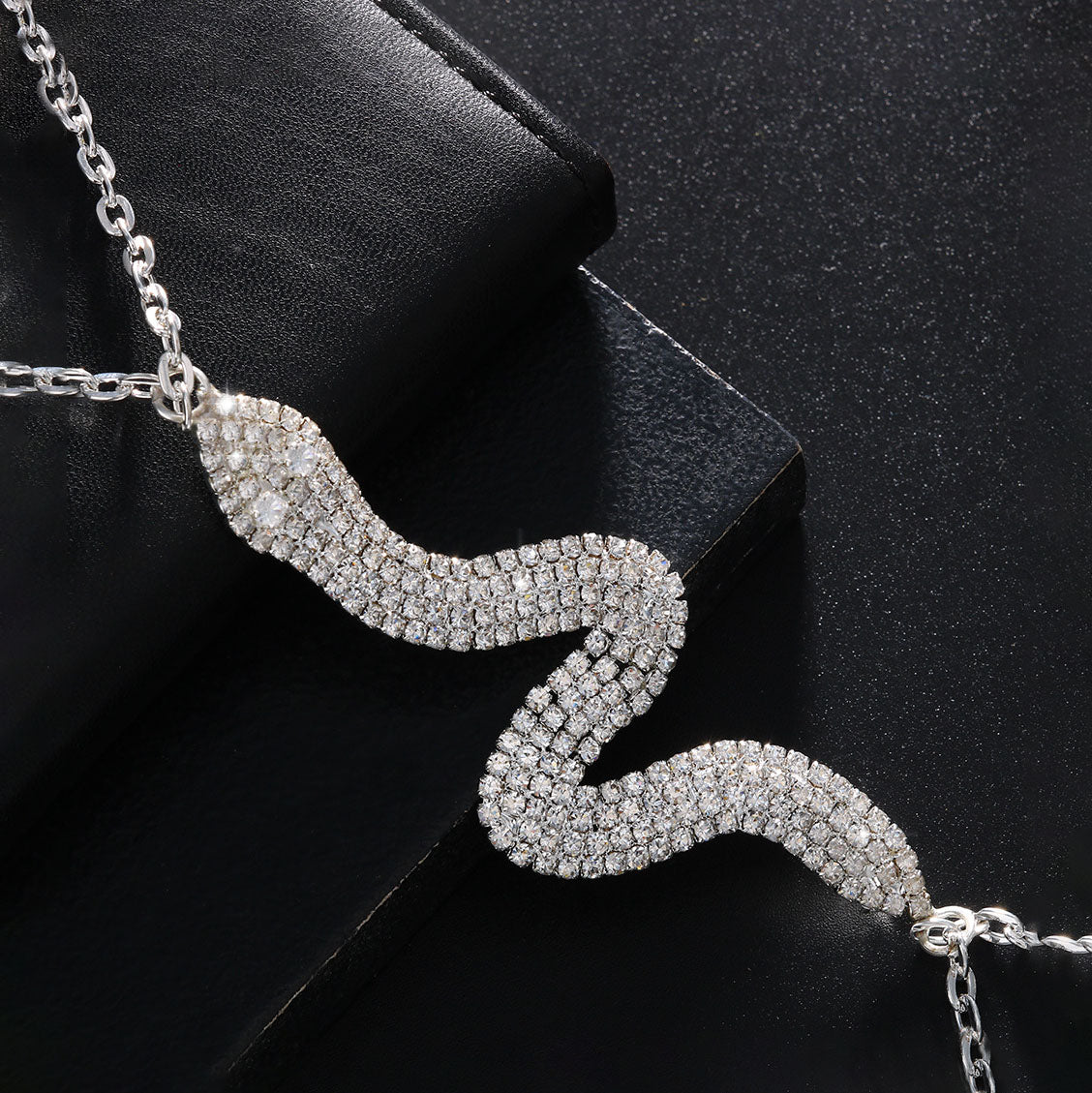 Sexy, sparkling serpentine rhinestone body chain