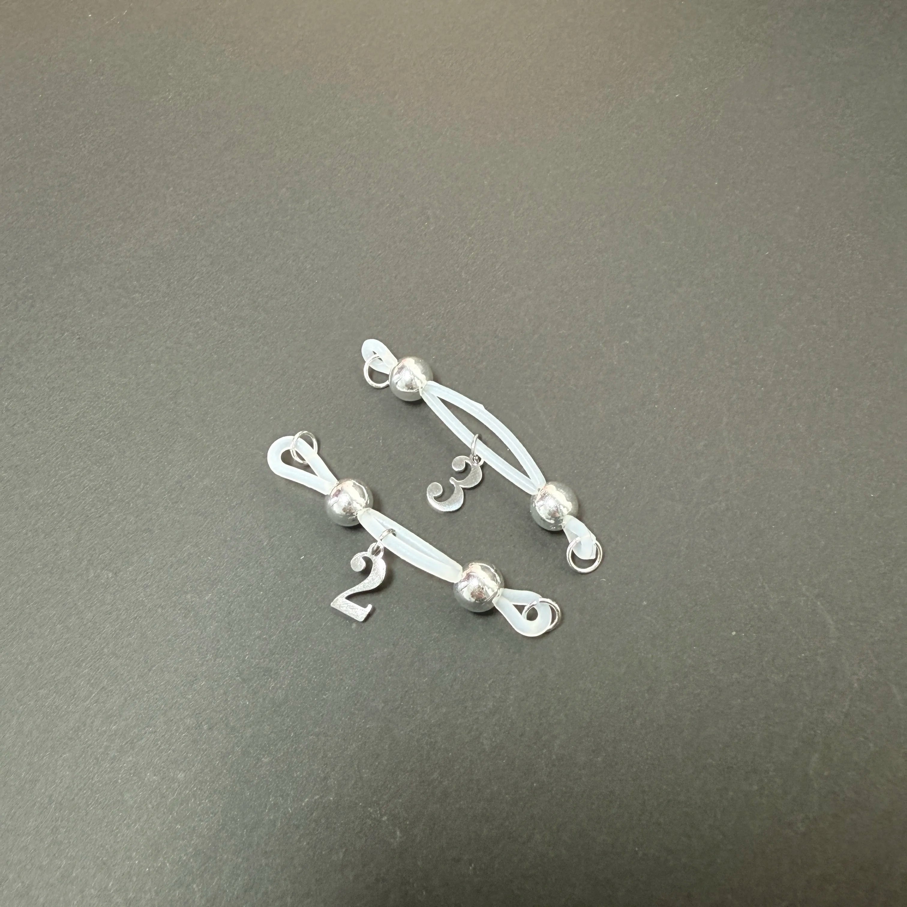 Adjustable nipple decoration - customizable with numbers 0-9