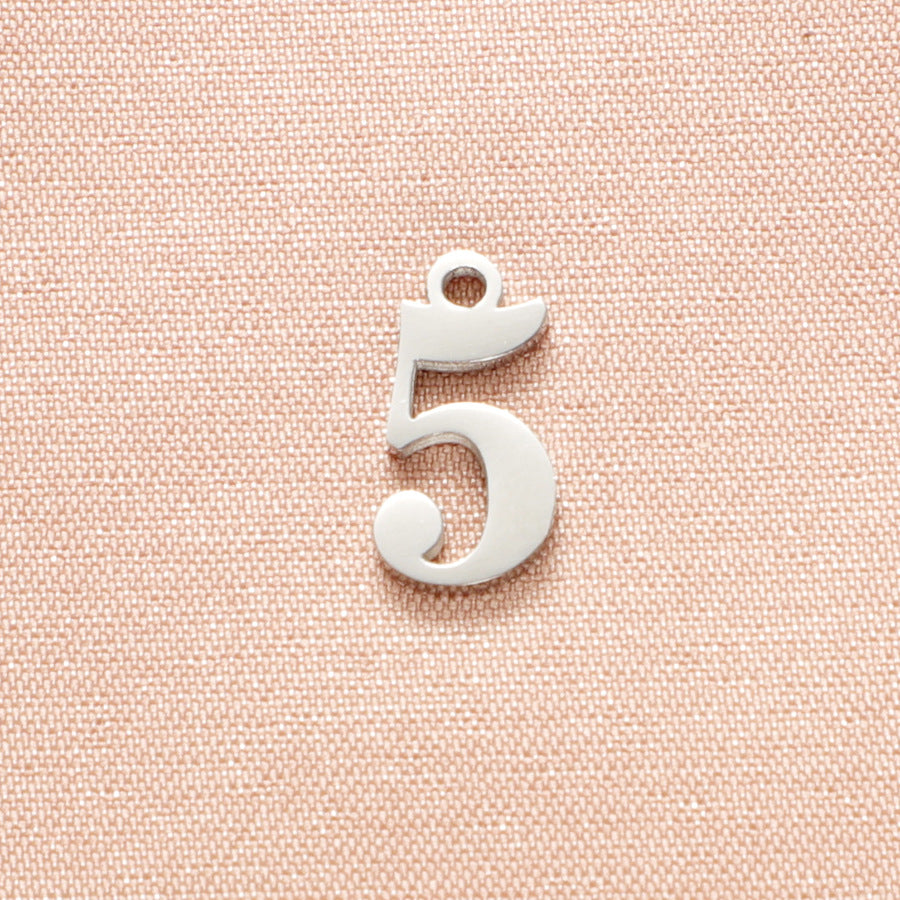 Adjustable nipple decoration - customizable with numbers 0-9