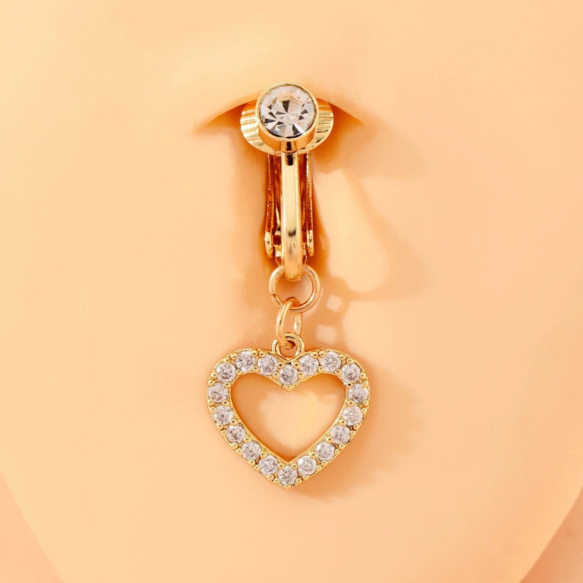 Non-piercing navel ring with a heart-shaped cubic zirconia