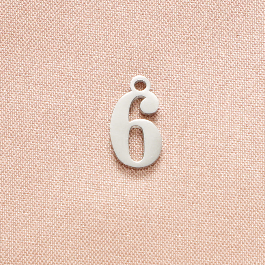 Adjustable nipple decoration - customizable with numbers 0-9