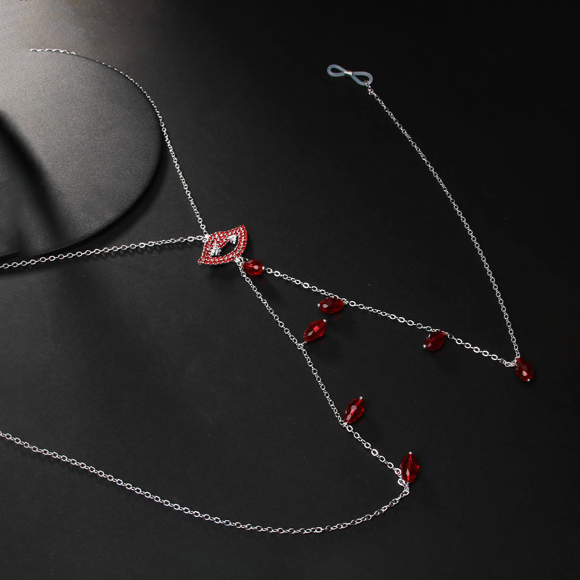 Red-lipped, innocent-yet-seductive style nipple chain