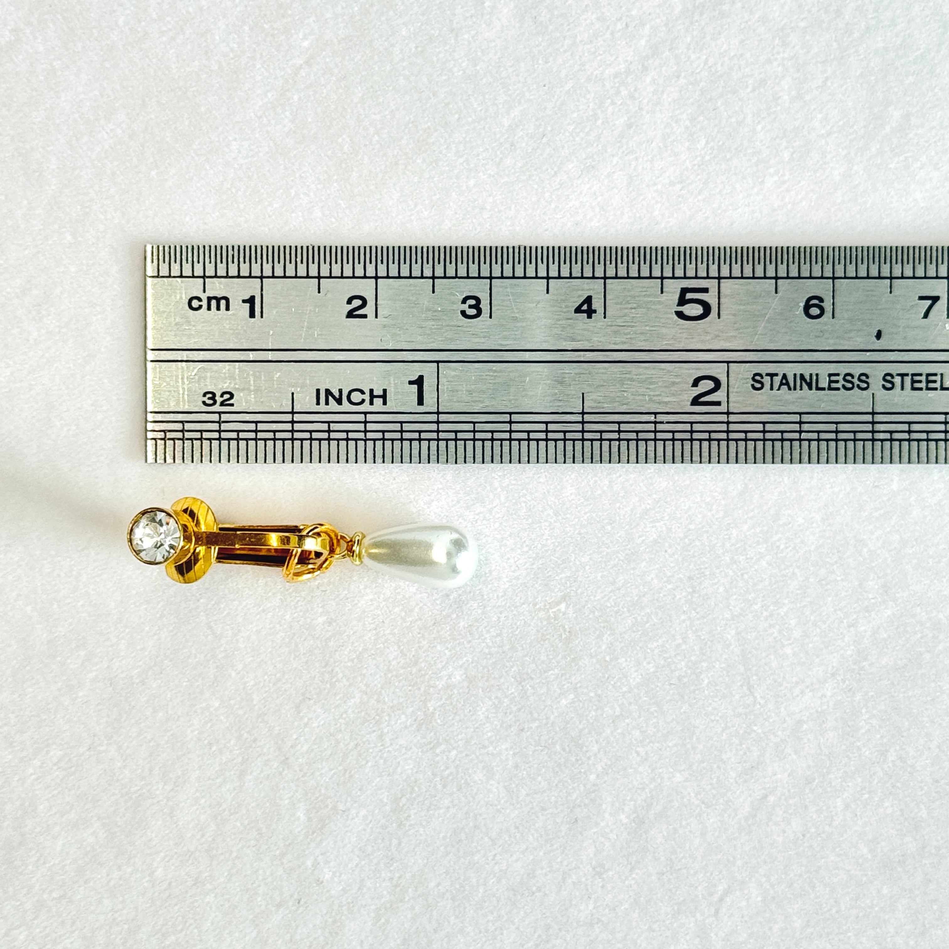 Adjustable pearl navel clip