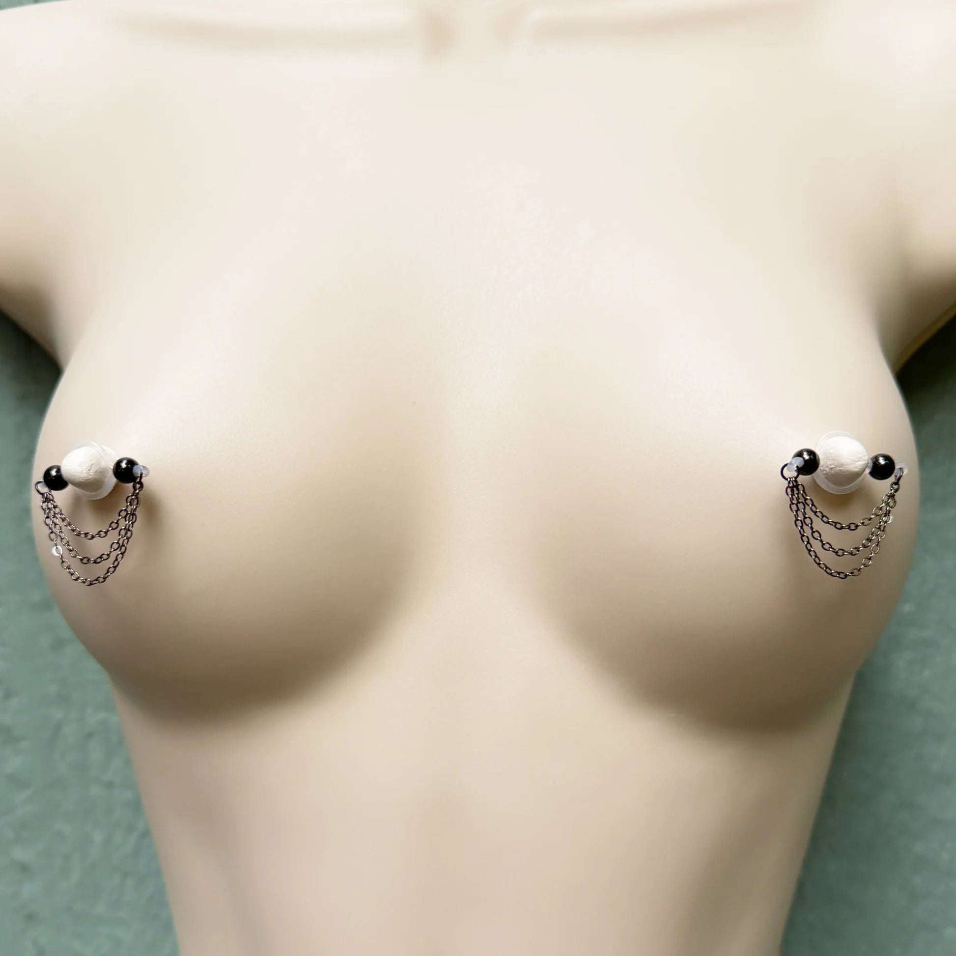 Black barbell nipple ring - triple chain