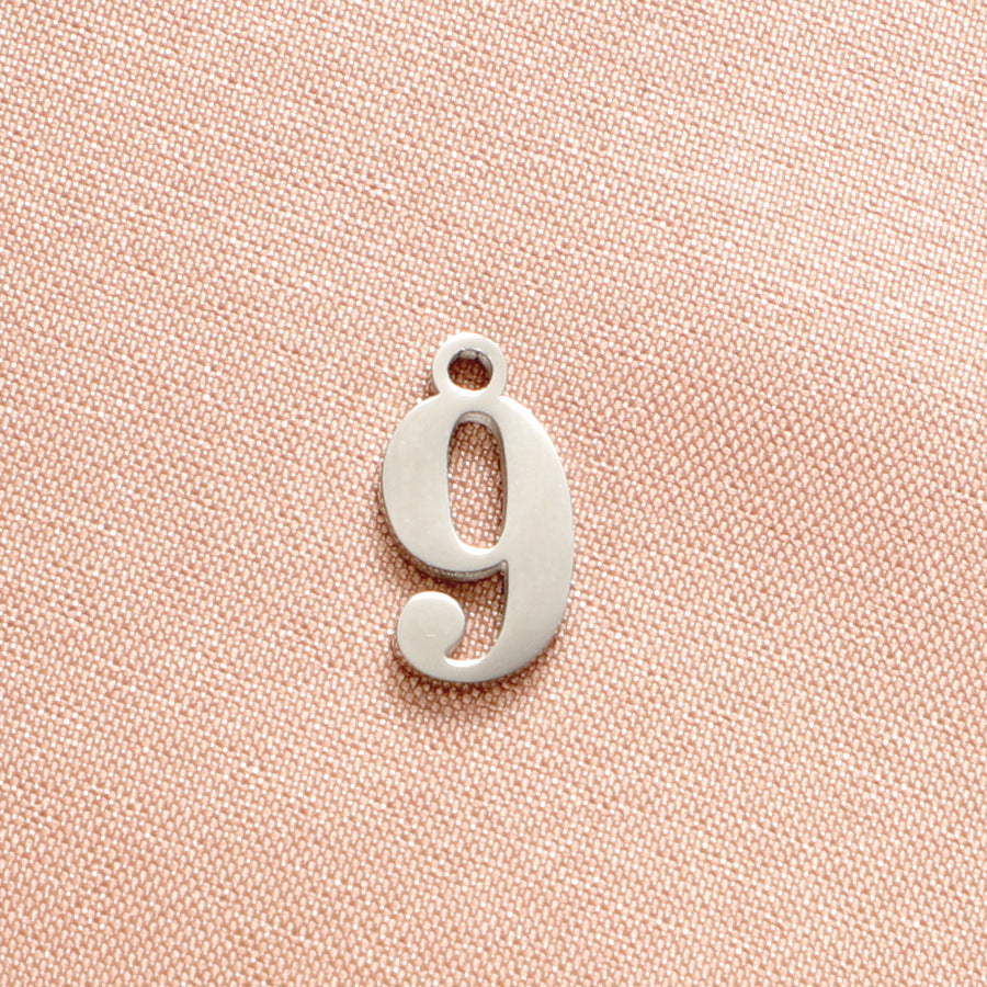 Adjustable nipple decoration - customizable with numbers 0-9