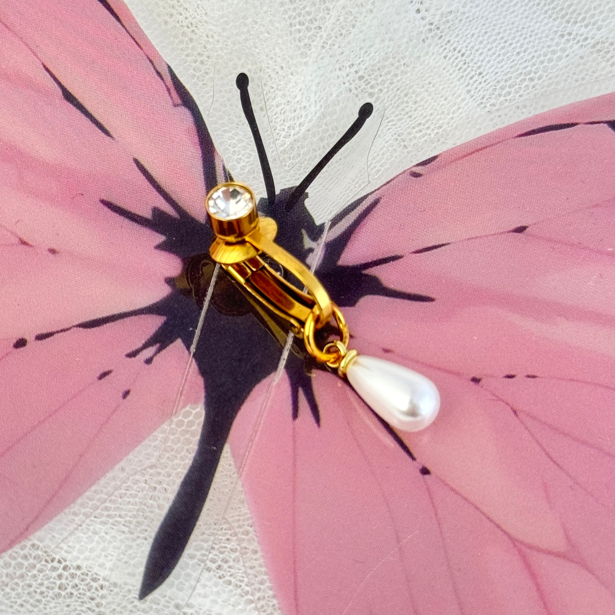 Adjustable pearl navel clip