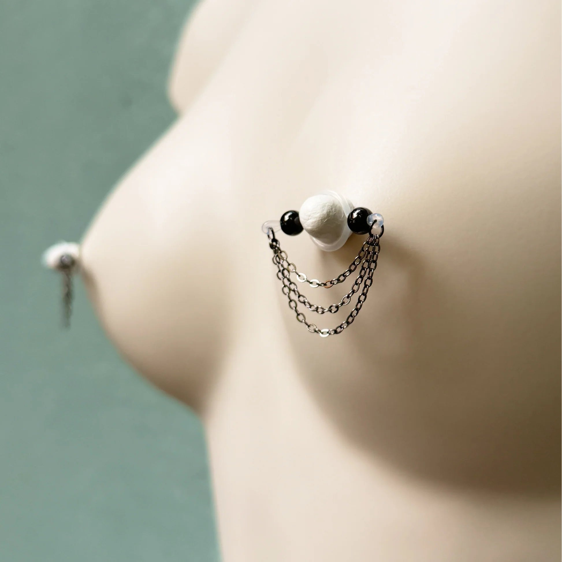 Black barbell nipple ring - triple chain