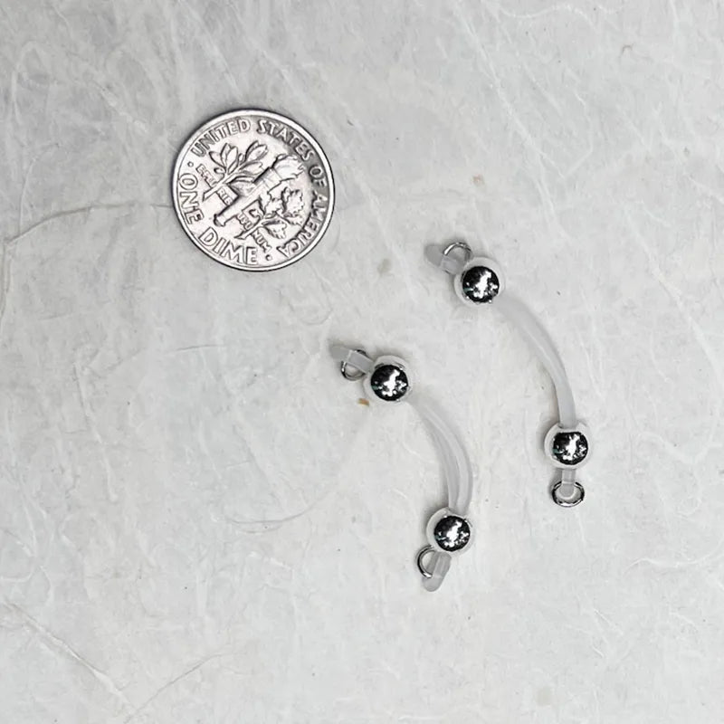Silver barbell nipple ring