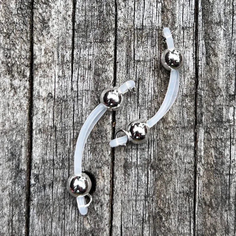 Silver barbell nipple ring