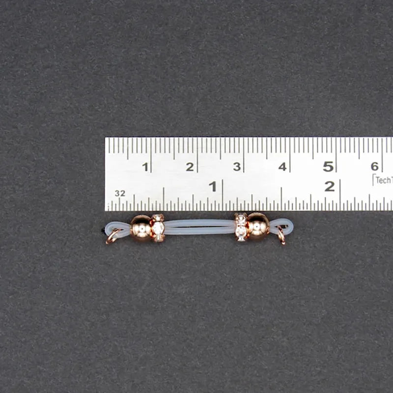 Rose gold plated barbell style nipple ring with diamonds