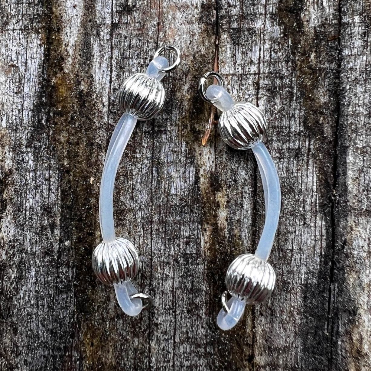 Silver barbell nipple jewelry