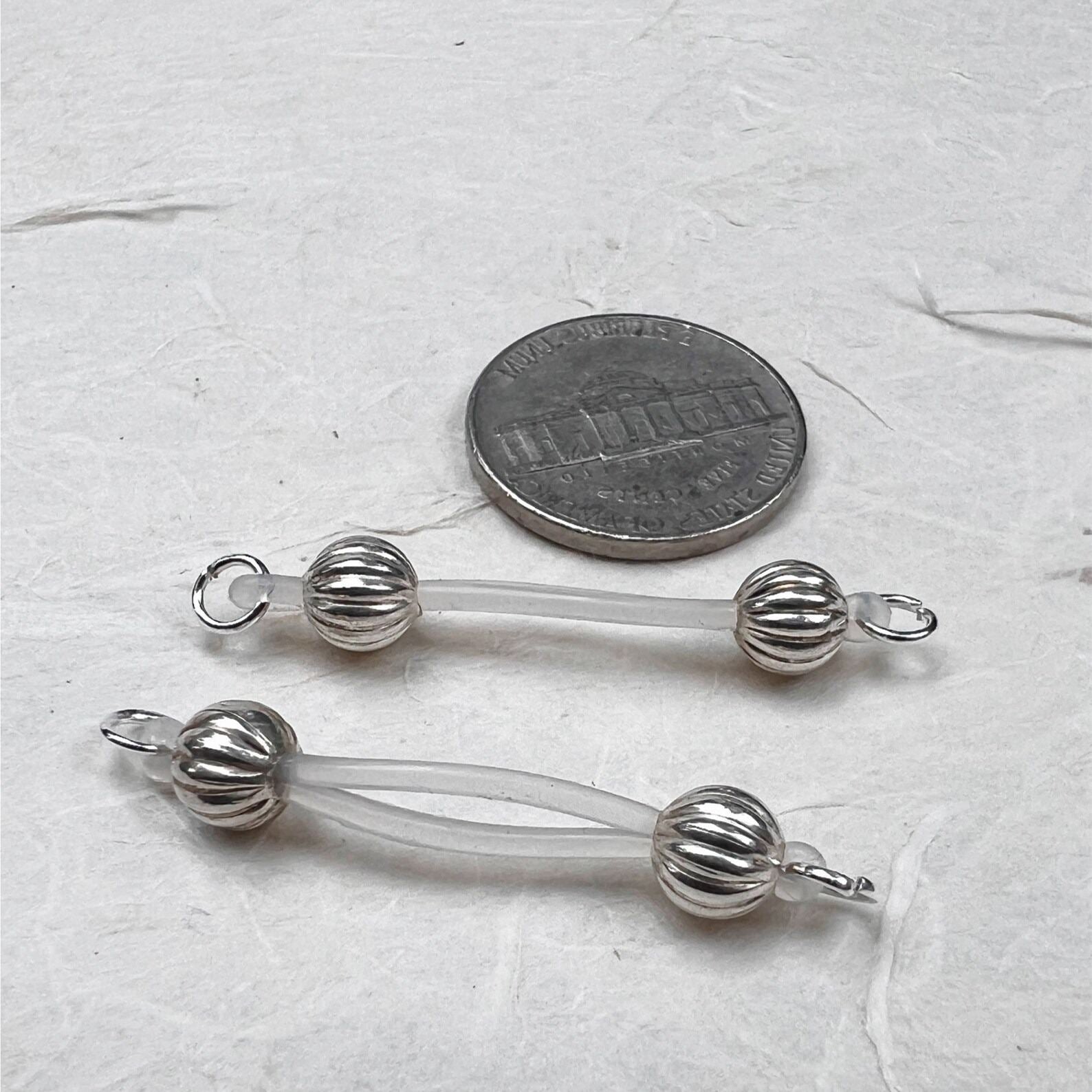 Silver barbell nipple jewelry