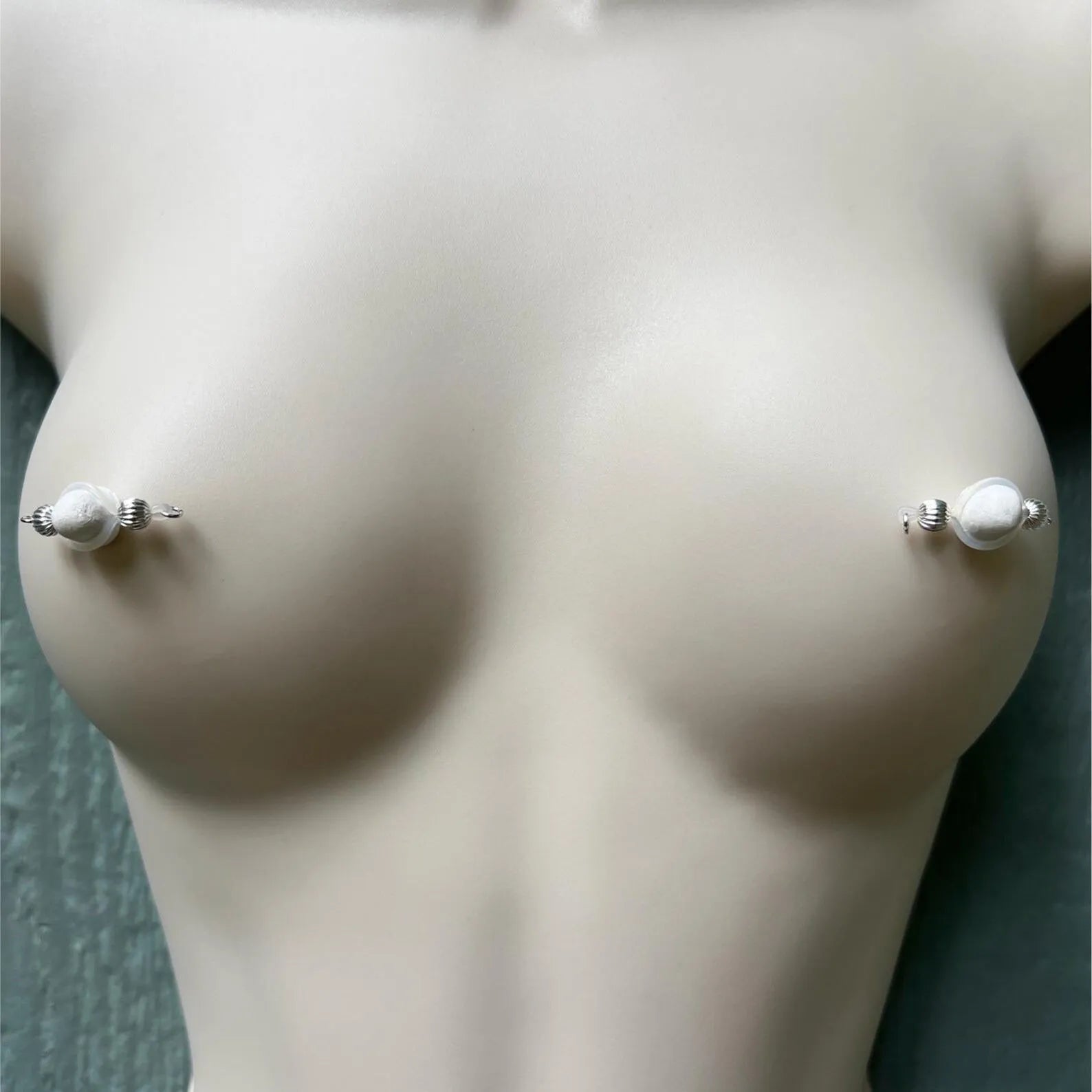 Silver barbell nipple jewelry